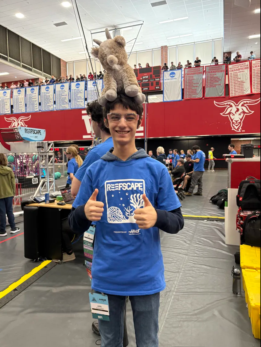 This is us volunteering at a Robotics event at WPI. I have Gompei on top of my head.