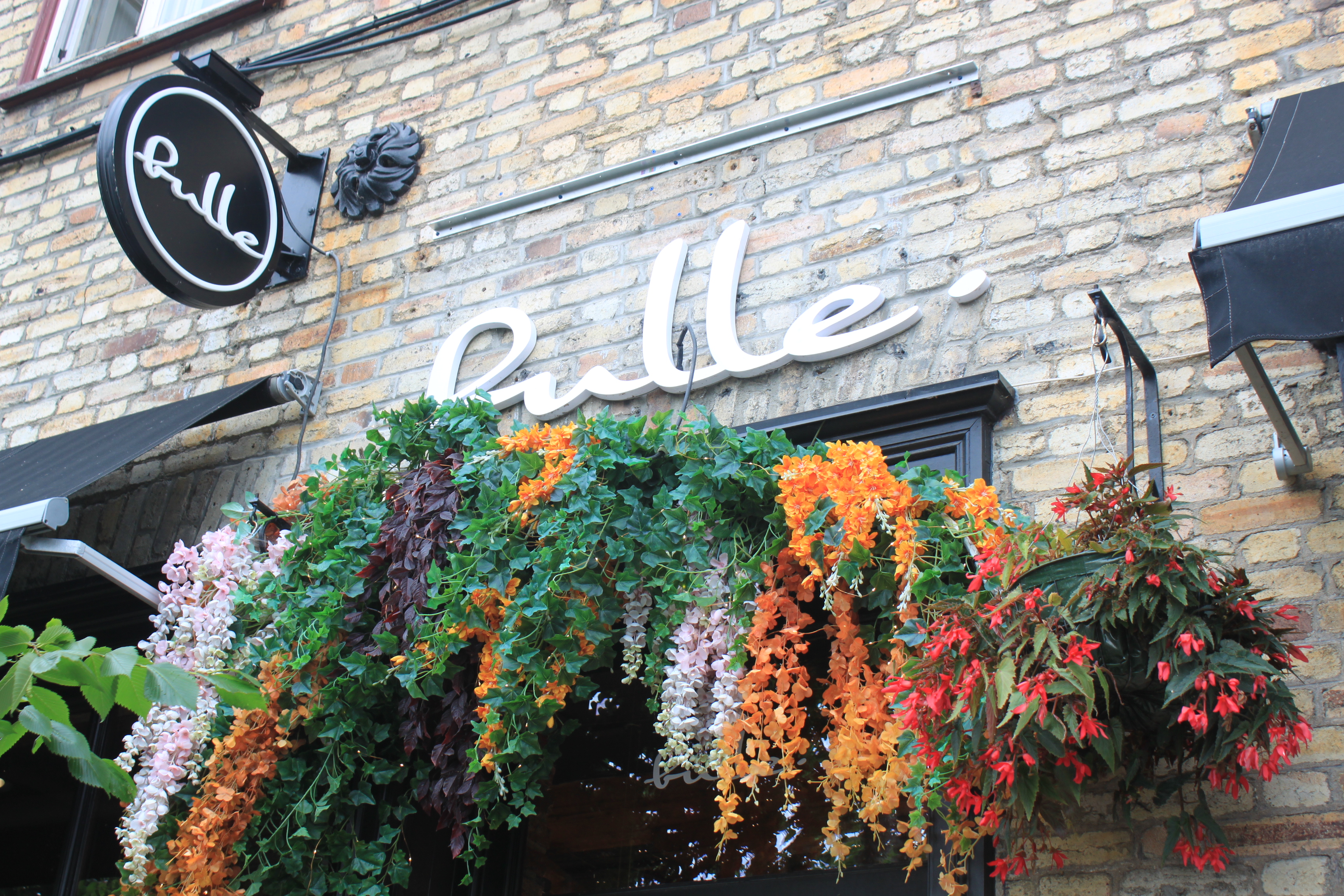 A storefront with flowers