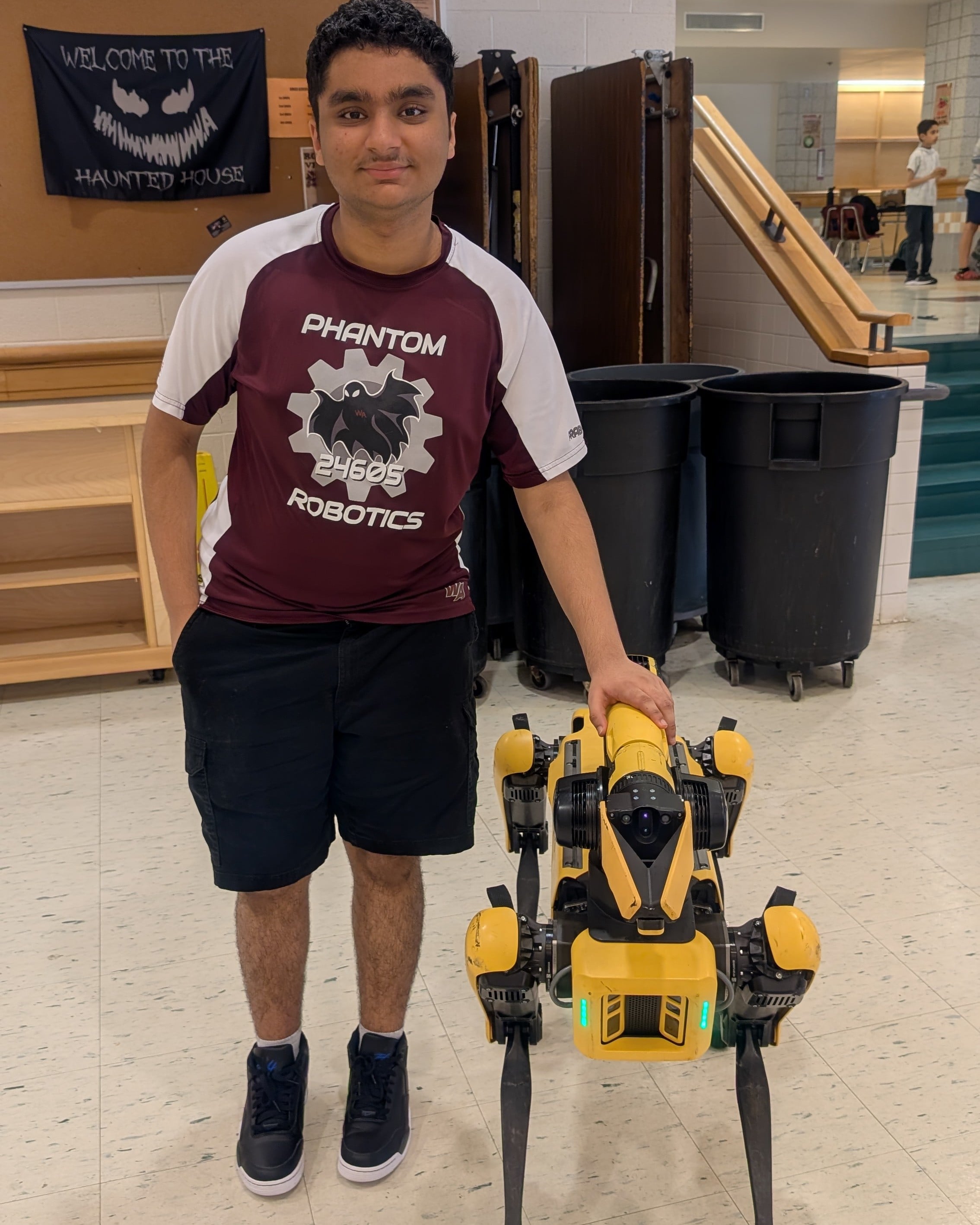 Arnav with Boston Dynamics' Robot Dog