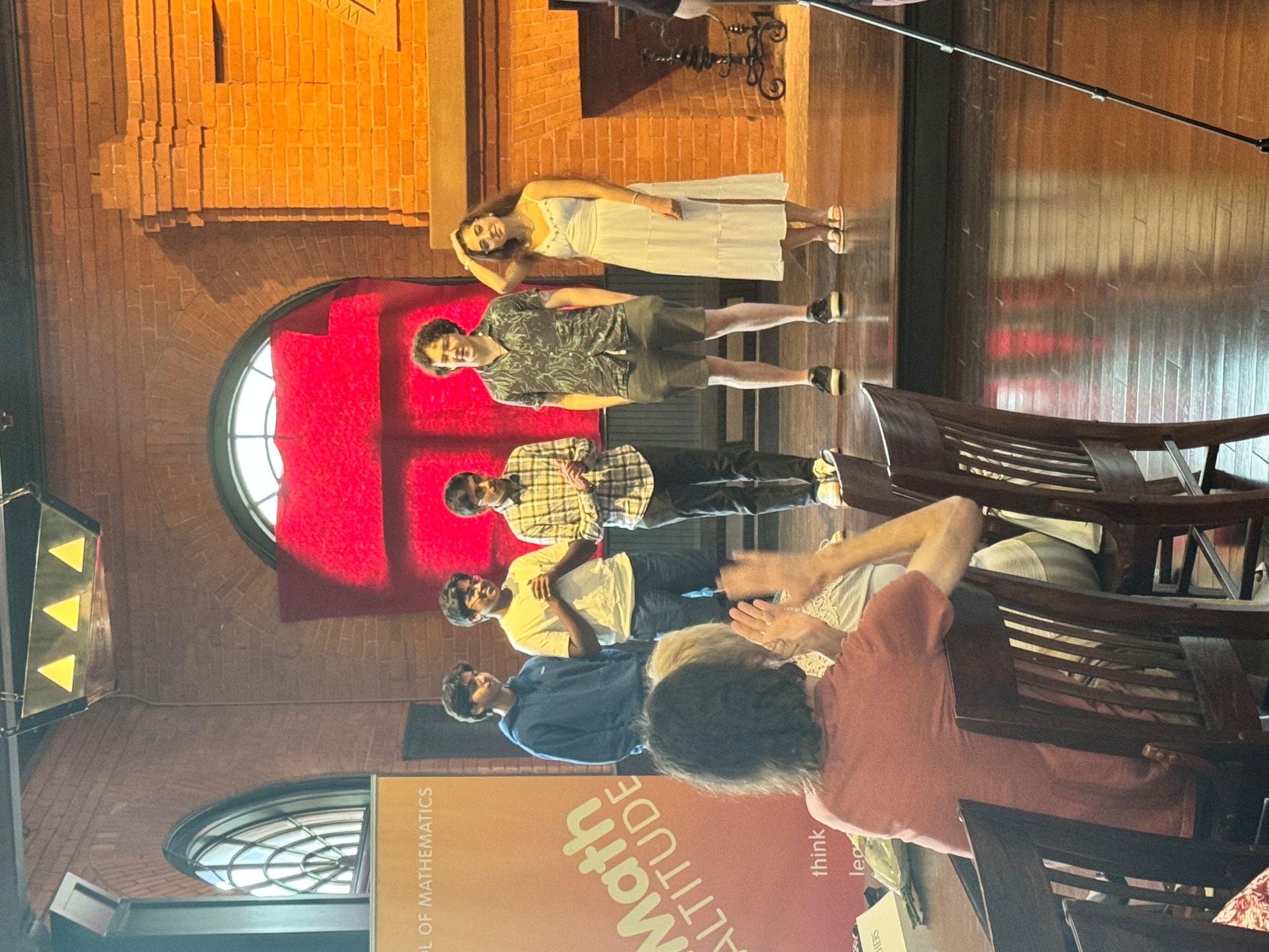 This is a photo of me receiving awards at a math event.