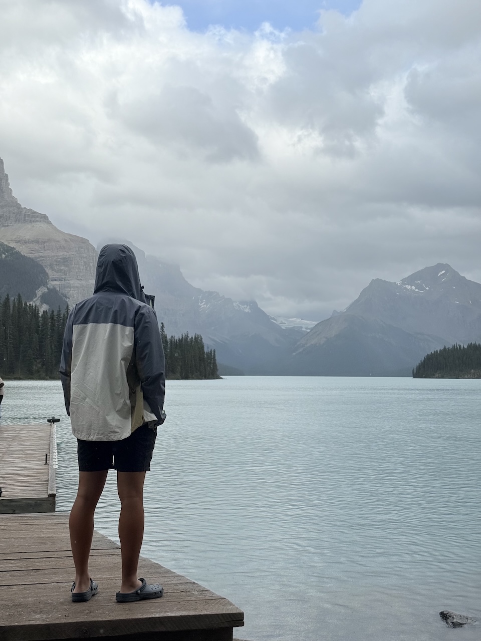 Me at a lake with mountains