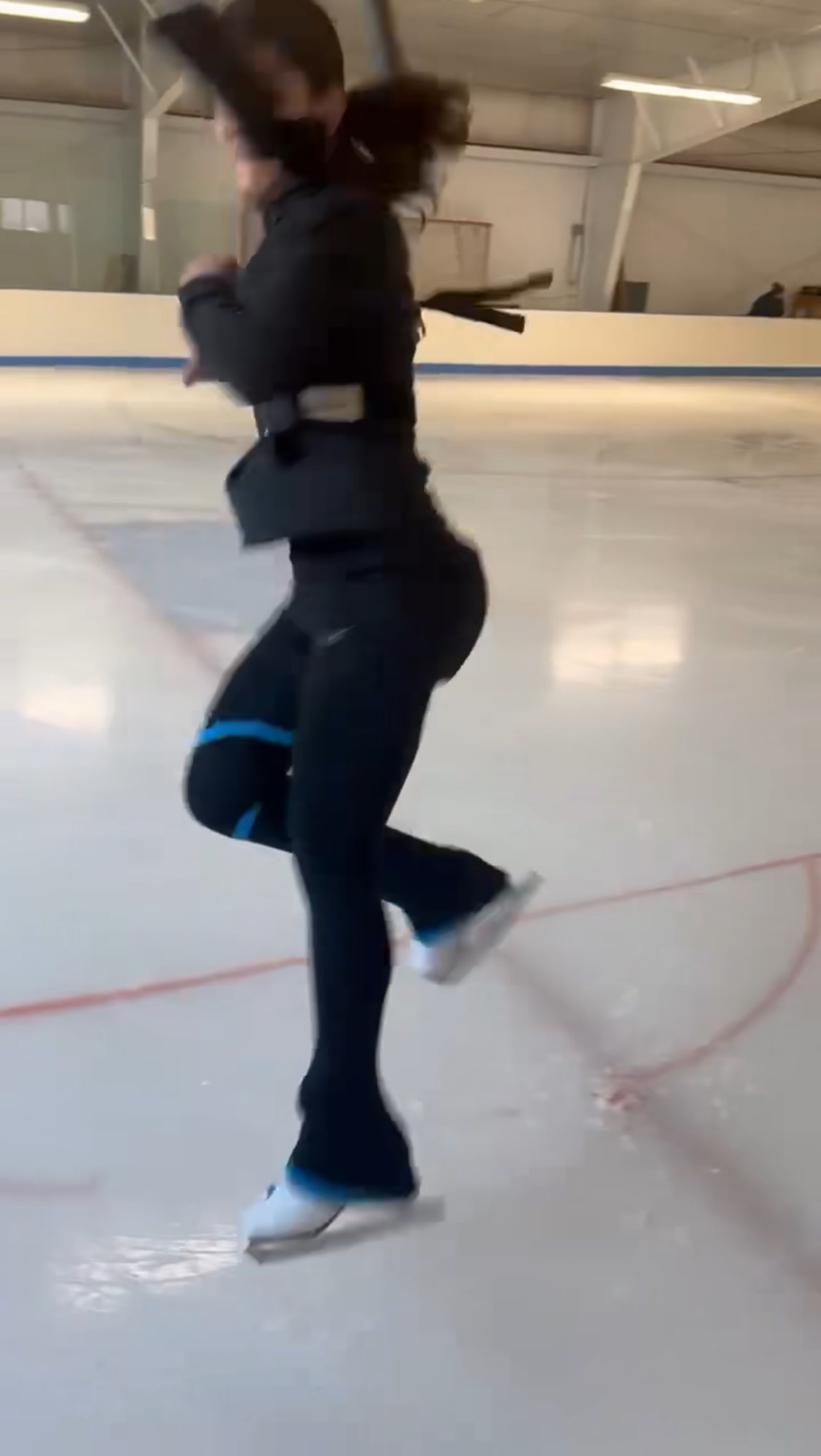 Me practicing axel on the harness