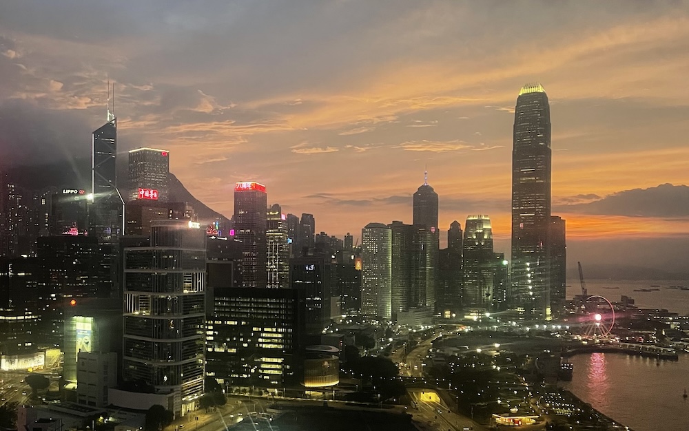 The view of Hong Kong at night, with a wide expanse of lights.
