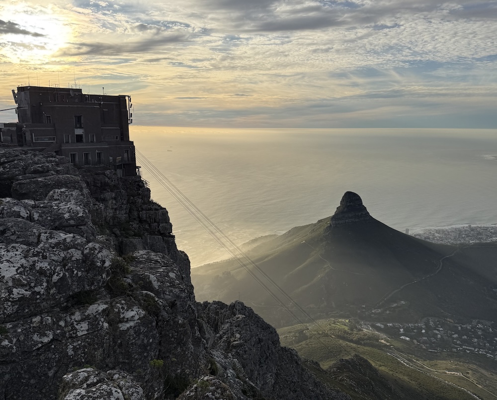 A view of the gondola and sunset from the top of Table Mountain.