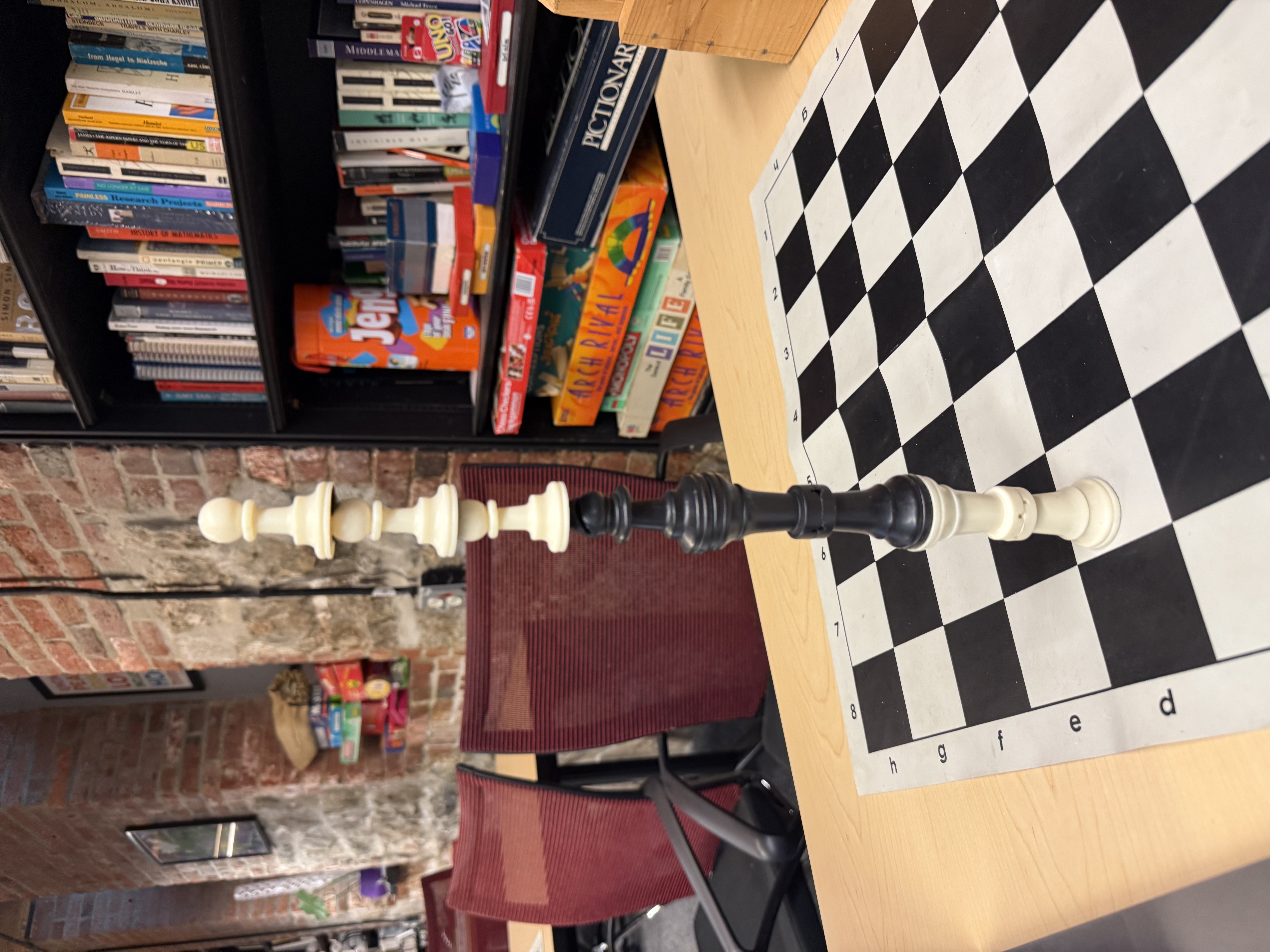 chess pieces stacked upon one another