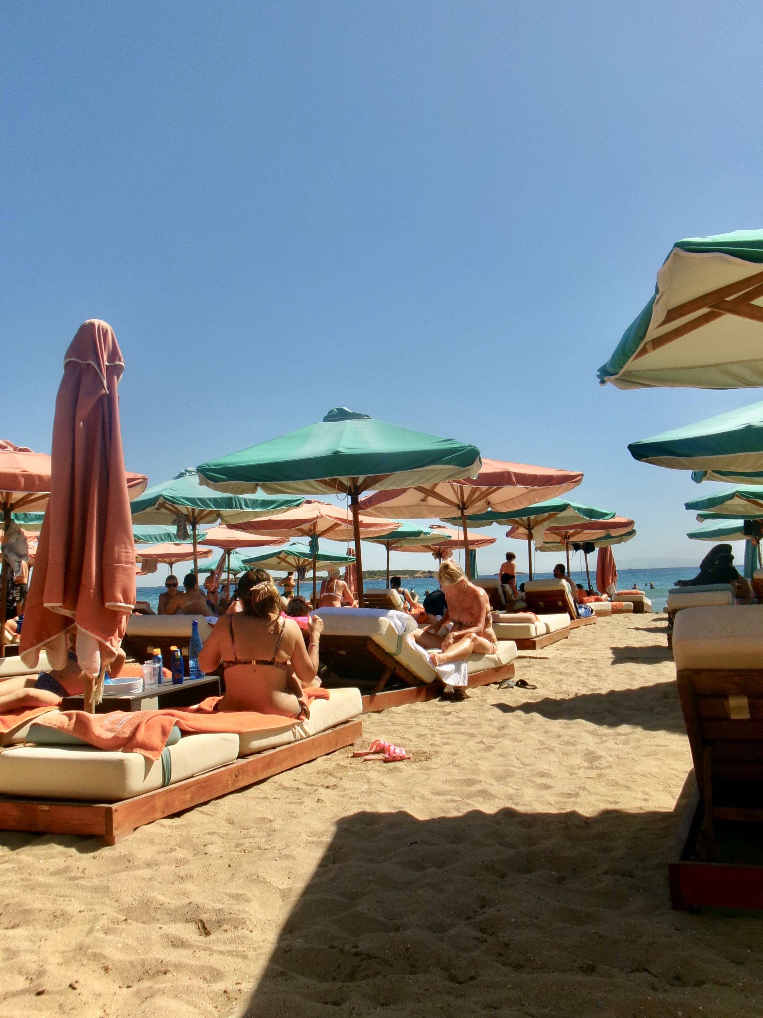 People laying down at the beach