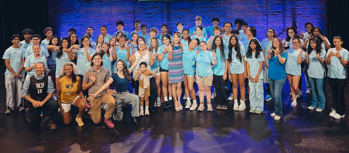 Group of teenage volunteers smiling together