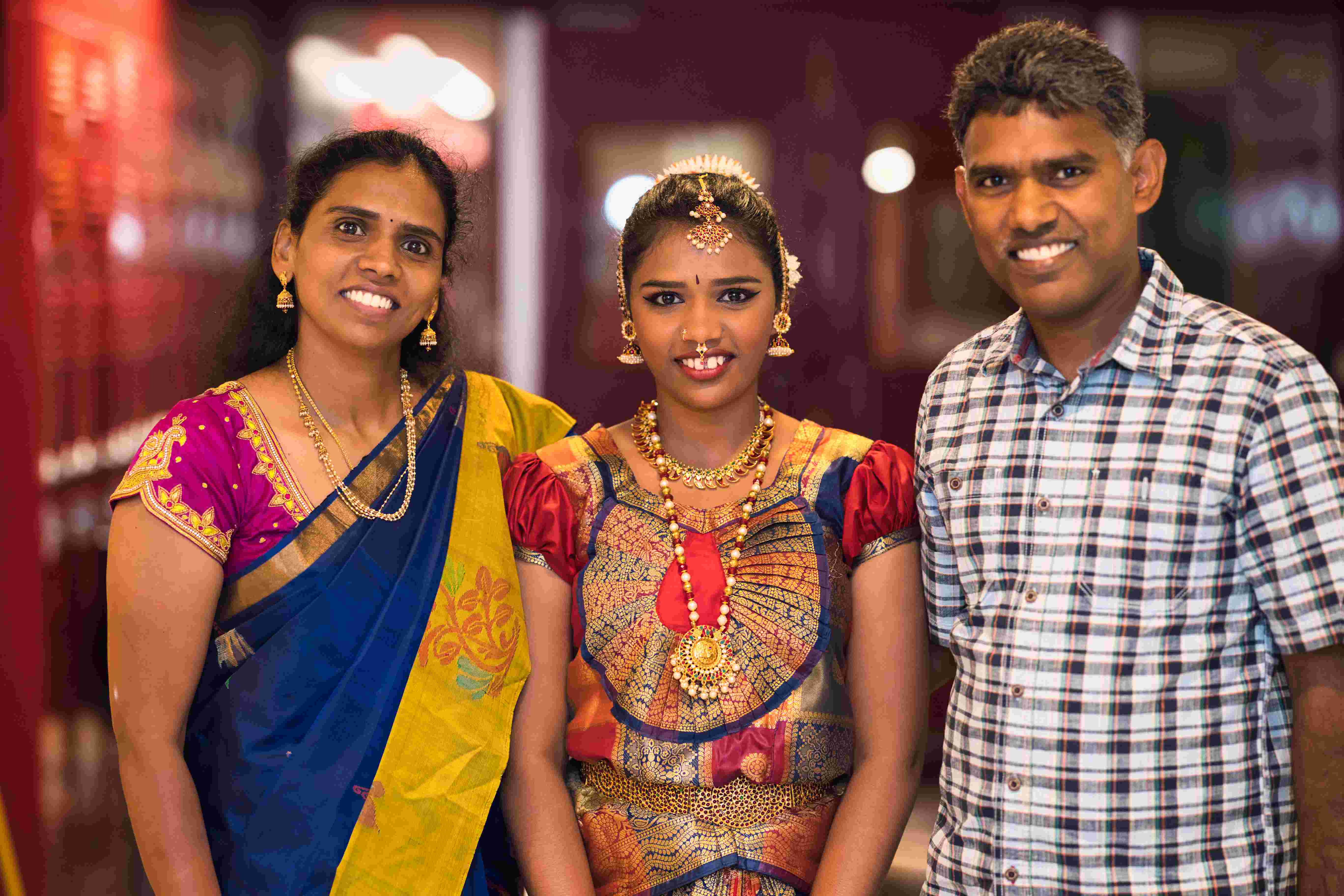 Picture of me and my parents at a dance production