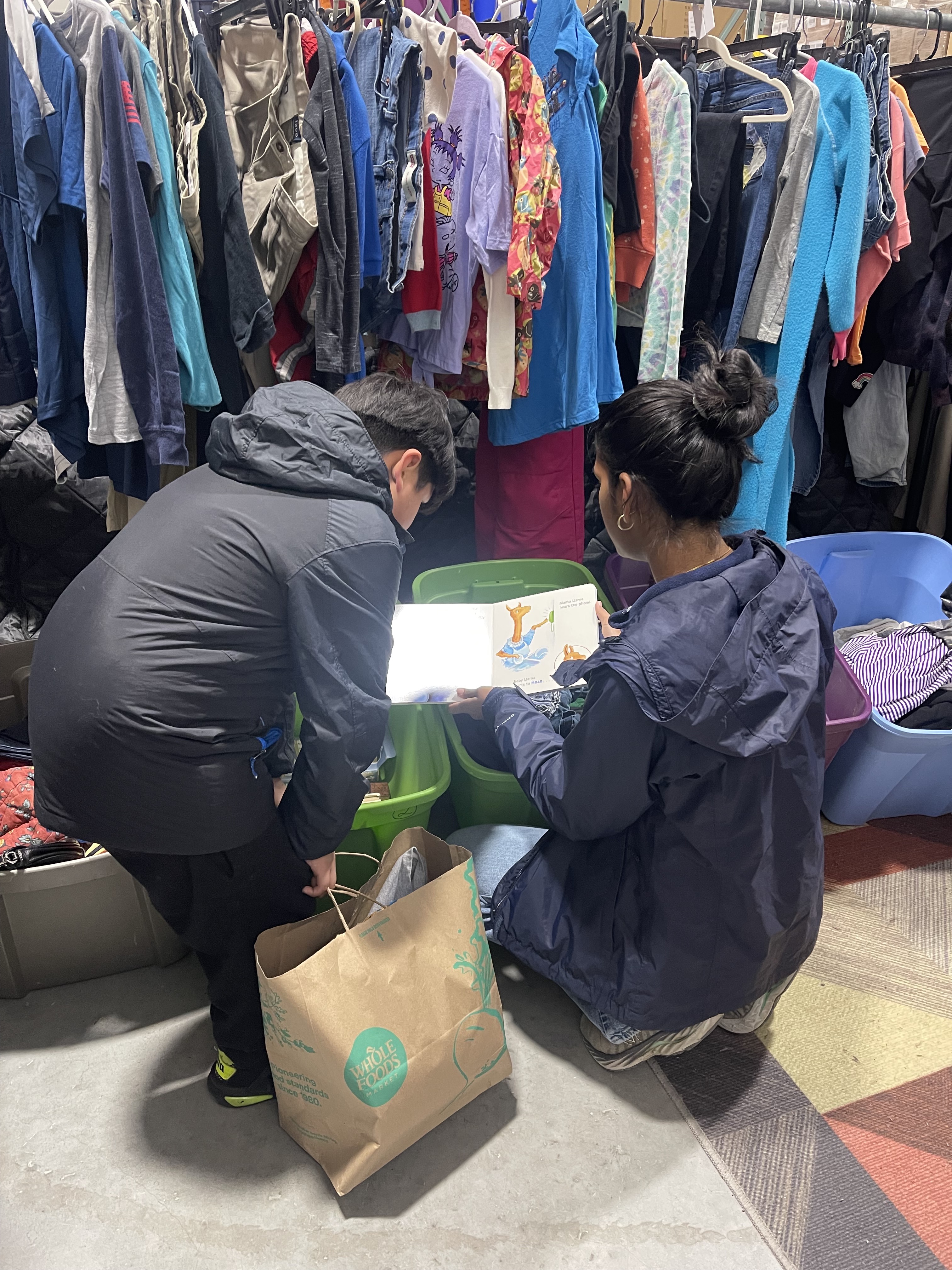 Image of me reading to an 11-year-old at Project Just Because