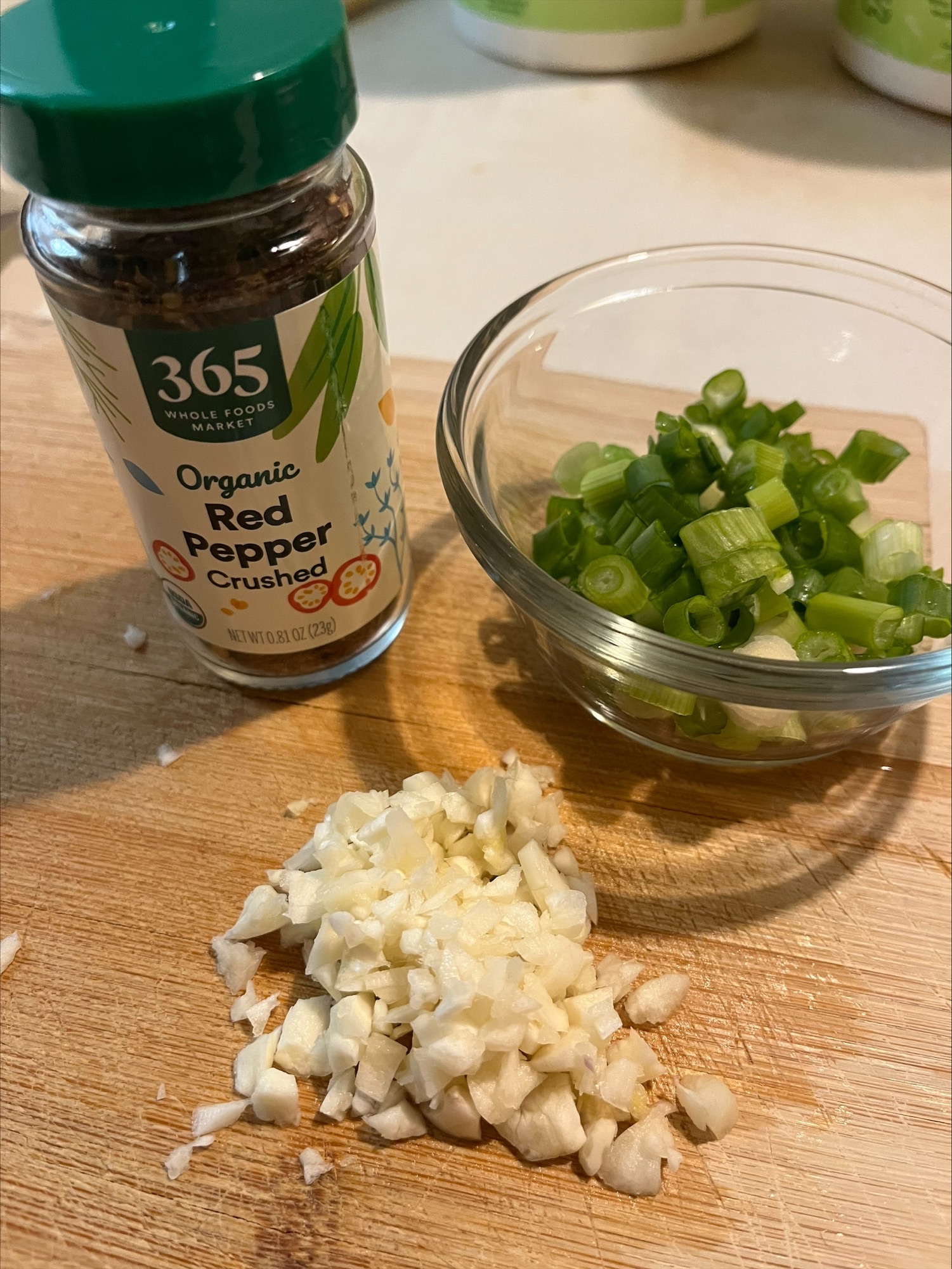 Making Chicken Sauce with Scallions, Garlic, and Crushed Red Pepper