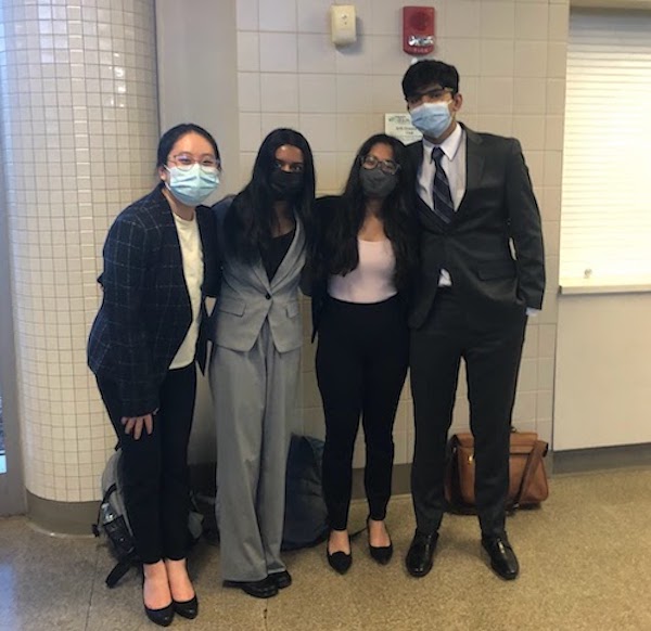 A photo of me and a few other Shrewsbury High School debaters. We are all 
					dressed up in our suits ready to win rounds