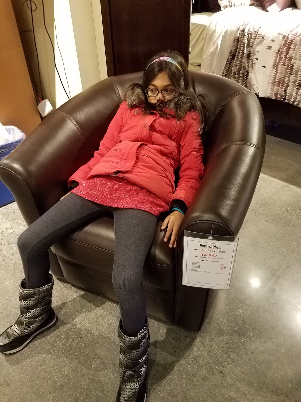 Young me slumped in a chair at Bernie and Phils!