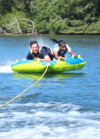 girl tubing on a lake